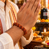 Orange Thread Breaded Rudraksha Bracelet