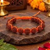 Orange Thread Breaded Rudraksha Bracelet