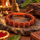 Orange Thread Breaded Rudraksha Bracelet